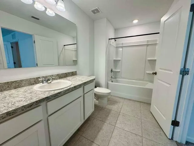 a view of a lake with houses