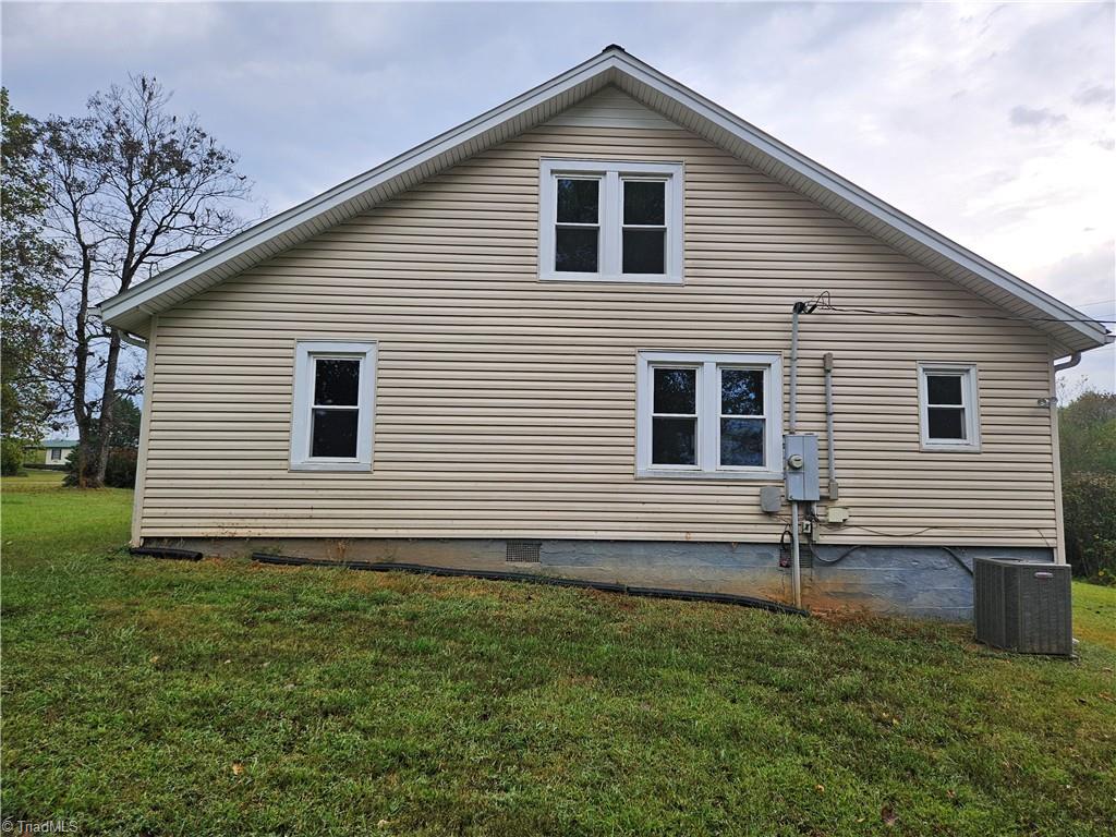 1661 River Siloam Road Siloam, NC 27047 - Photo 8 of 11 Side of house