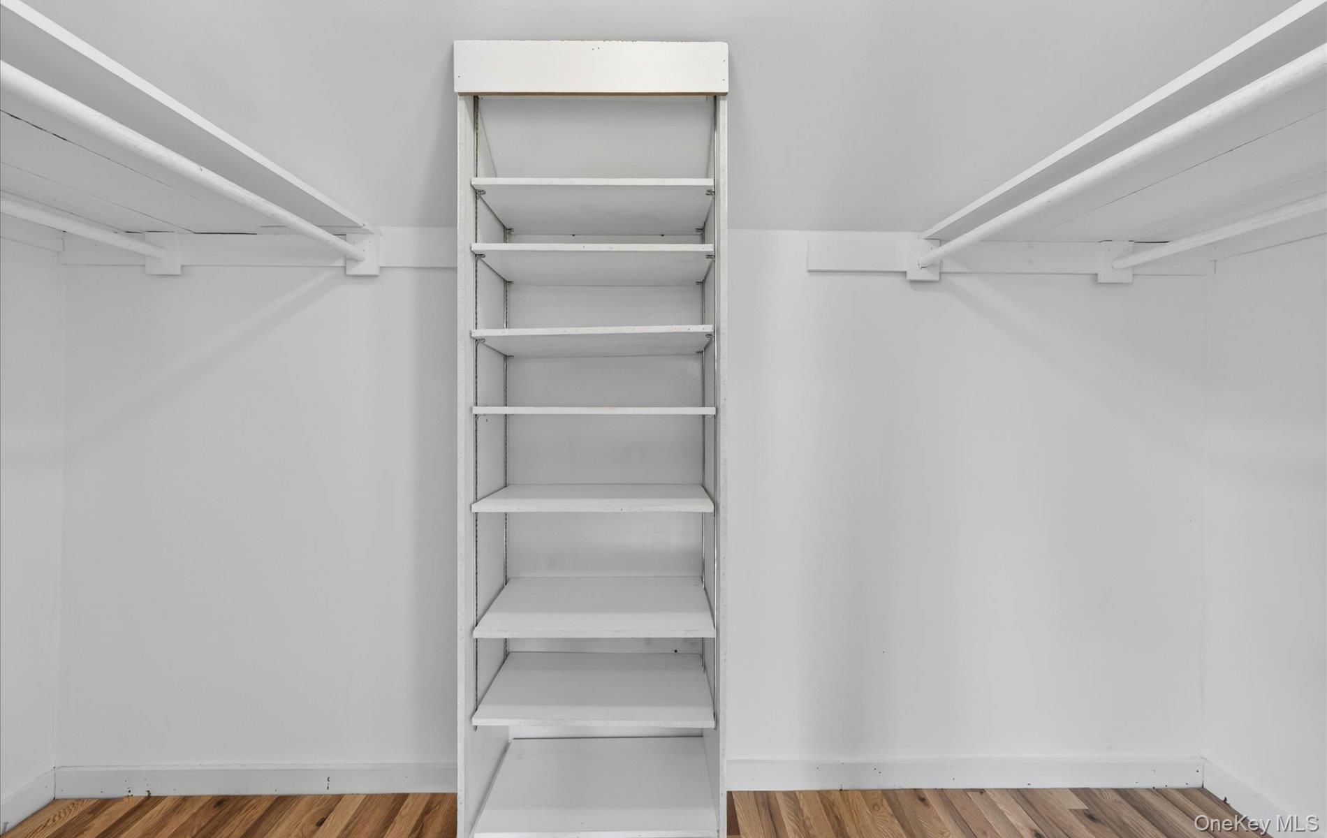 24 Purdue Road Glen Cove, NY 11542 - Photo 26 of 41 a view of walk in closet with empty racks