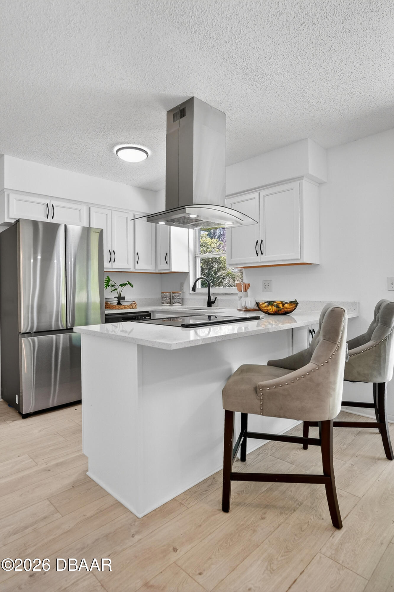 1147 Harms Way Port Orange, FL 32129 - Photo 13 of 38 a kitchen with stainless steel appliances a dining table chairs and refrigerator