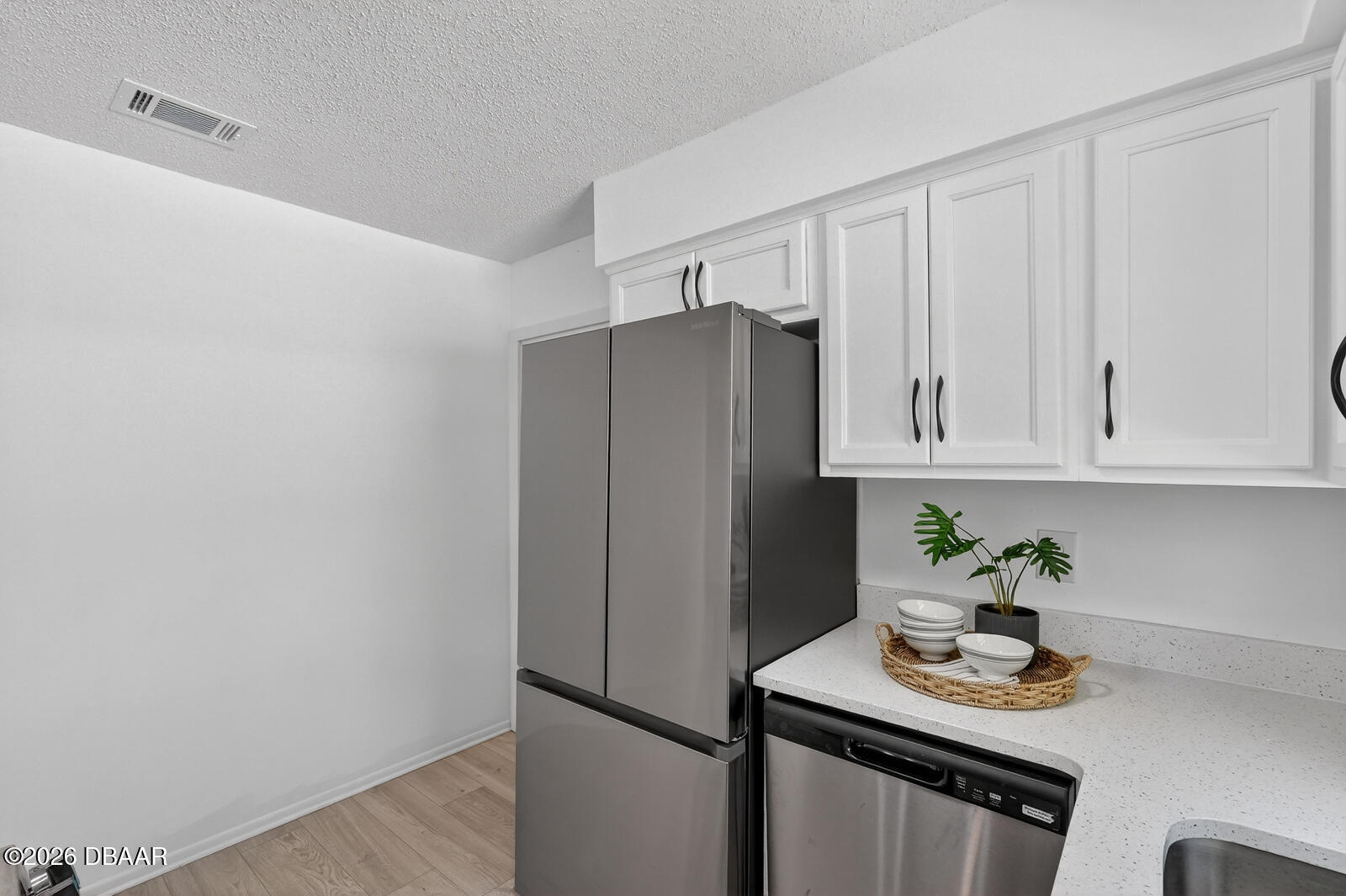 1147 Harms Way Port Orange, FL 32129 - Photo 18 of 38 a white refrigerator freezer sitting in a kitchen