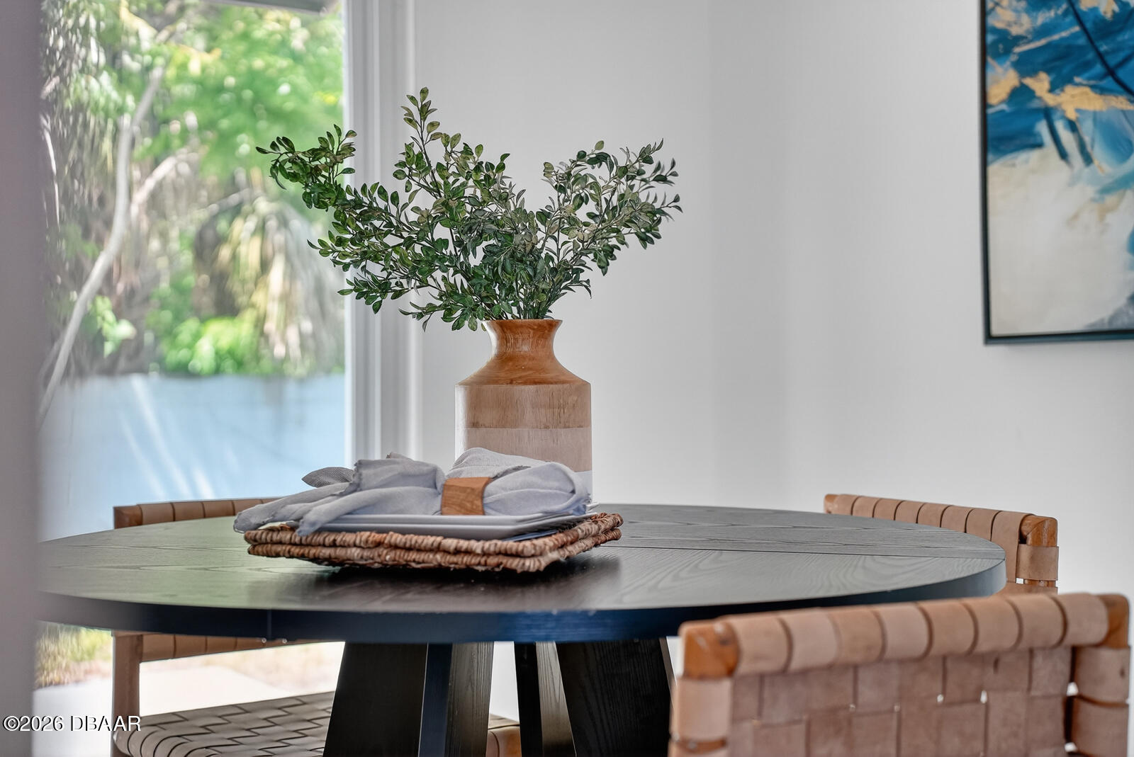 1147 Harms Way Port Orange, FL 32129 - Photo 21 of 38 a table with a vase and a vase on it