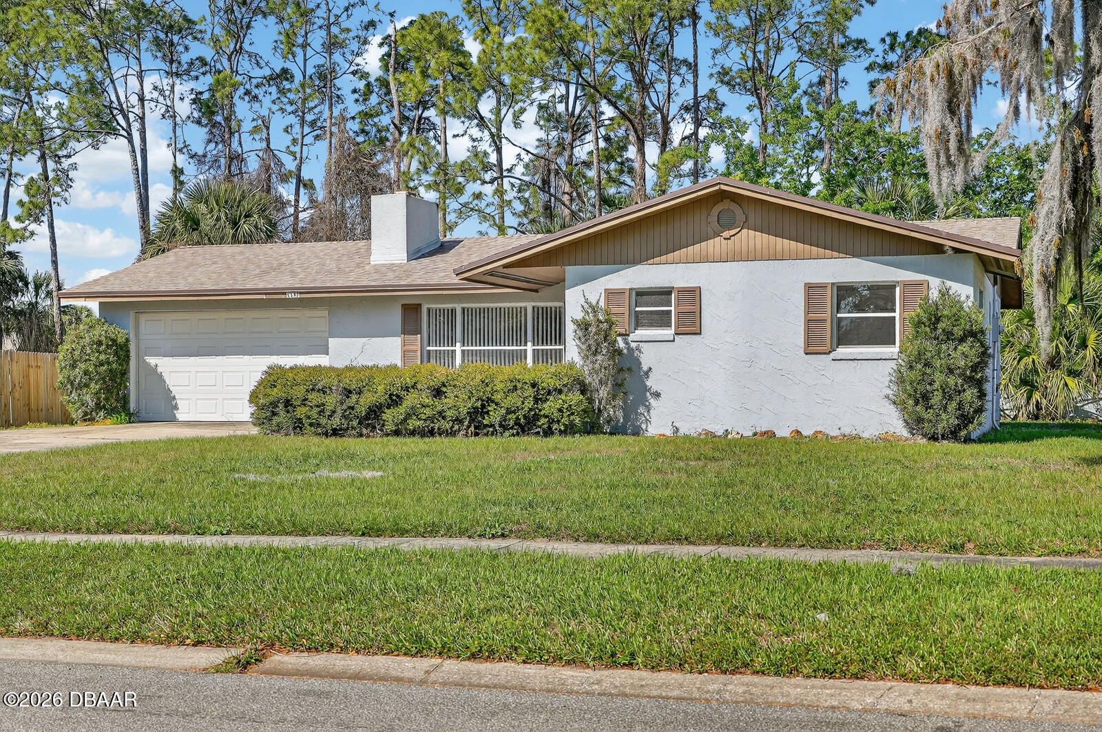 1147 Harms Way Port Orange, FL 32129 - Photo 3 of 38 a front view of a house with a yard