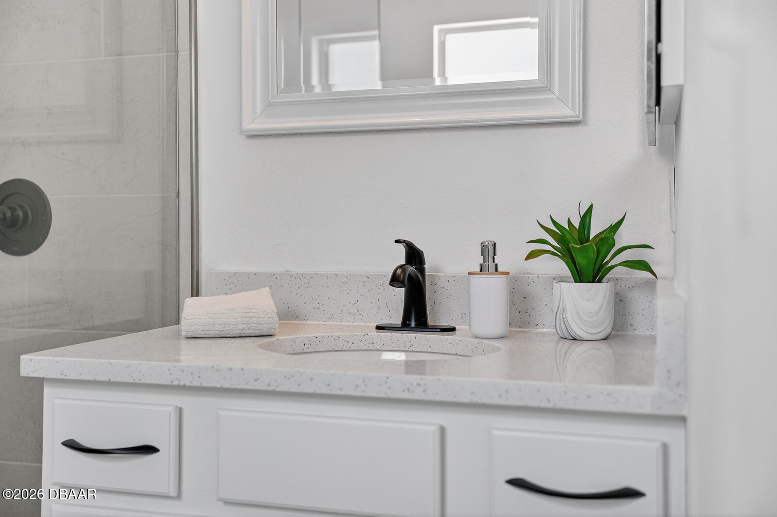 1147 Harms Way Port Orange, FL 32129 - Photo 31 of 38 a bathroom with a sink a vanity and a mirror