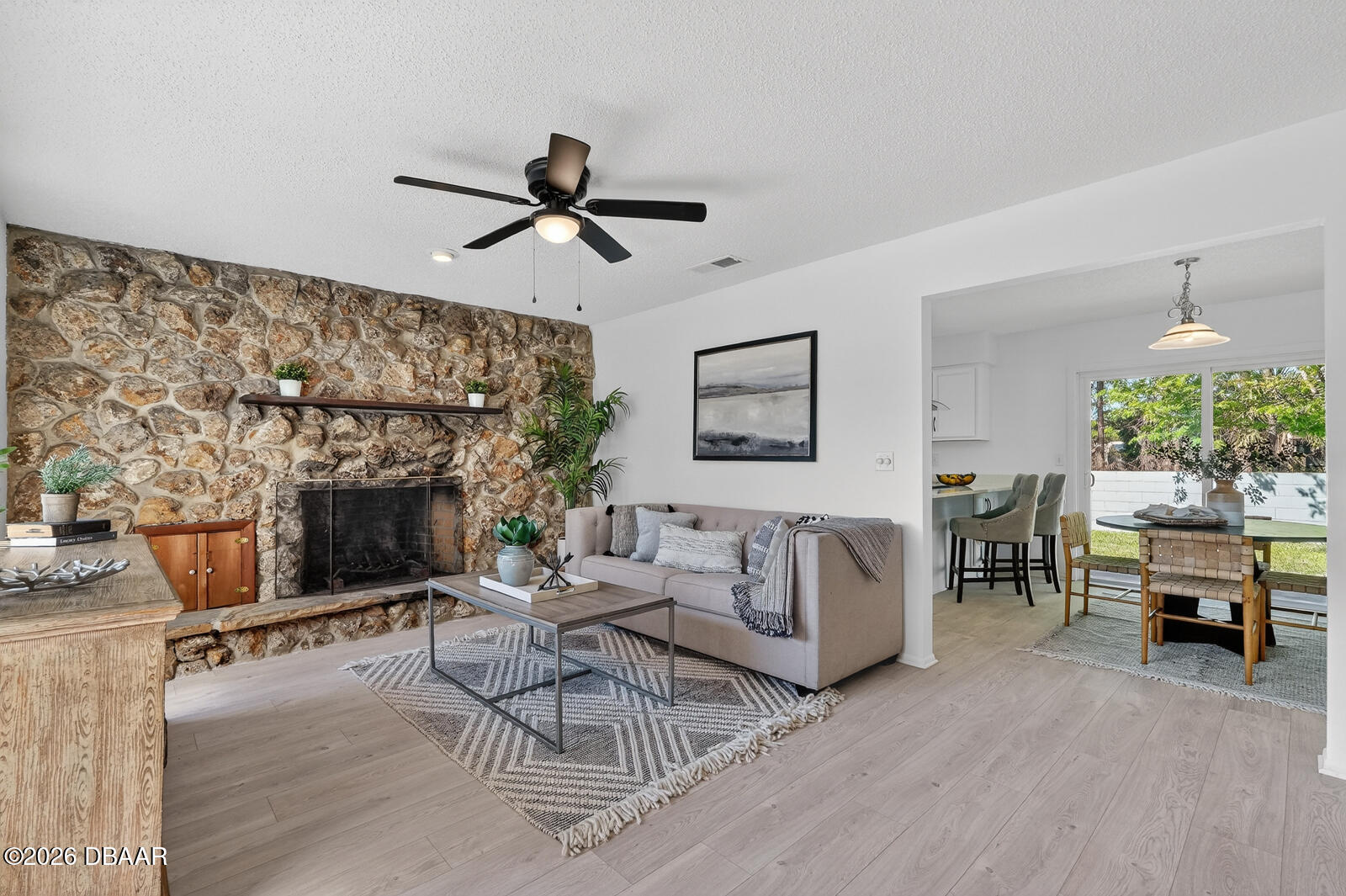 1147 Harms Way Port Orange, FL 32129 - Photo 6 of 38 a living room with furniture and a fireplace