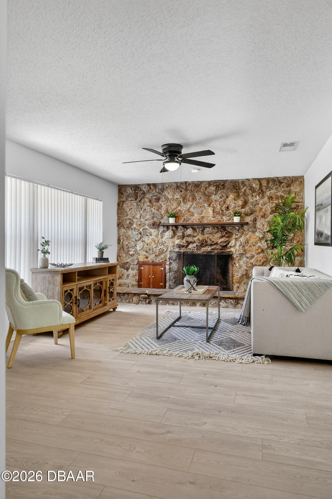1147 Harms Way Port Orange, FL 32129 - Photo 9 of 38 a living room with furniture and a fireplace