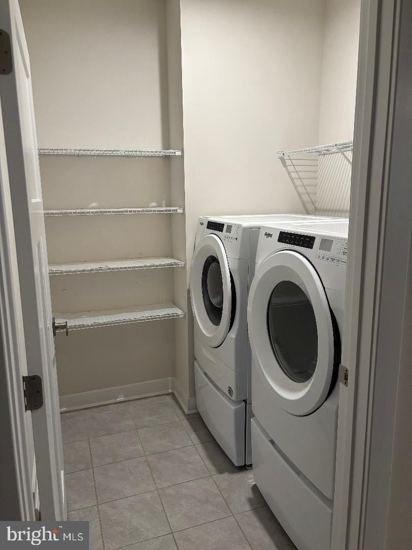 36884 Red Cedar Loop Ocean View, DE 19970 - Photo 41 of 50 a utility room with dryer and washer