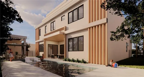 a front view of a house with outdoor seating