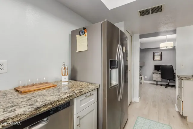 a kitchen with a stove and a microwave