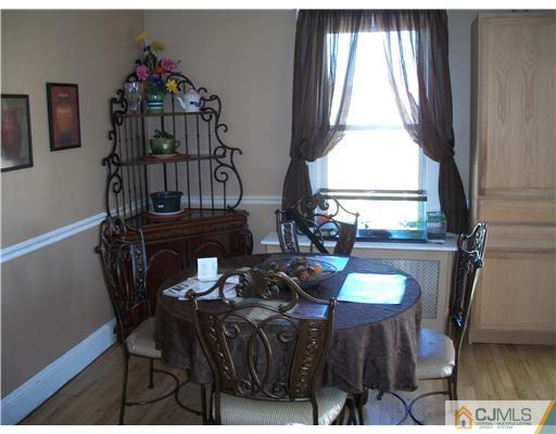 176 Rector Street Perth Amboy, NJ 08861 - Photo 14 of 24 a view of balcony with furniture and window