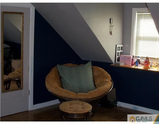 176 Rector Street Perth Amboy, NJ 08861 - Photo 18 of 24 a room with furniture and window