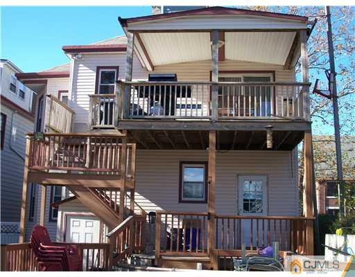 176 Rector Street Perth Amboy, NJ 08861 - Photo 21 of 24 a front view of a house with balcony