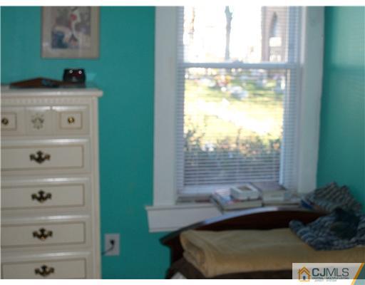 176 Rector Street Perth Amboy, NJ 08861 - Photo 5 of 24 a view of a window