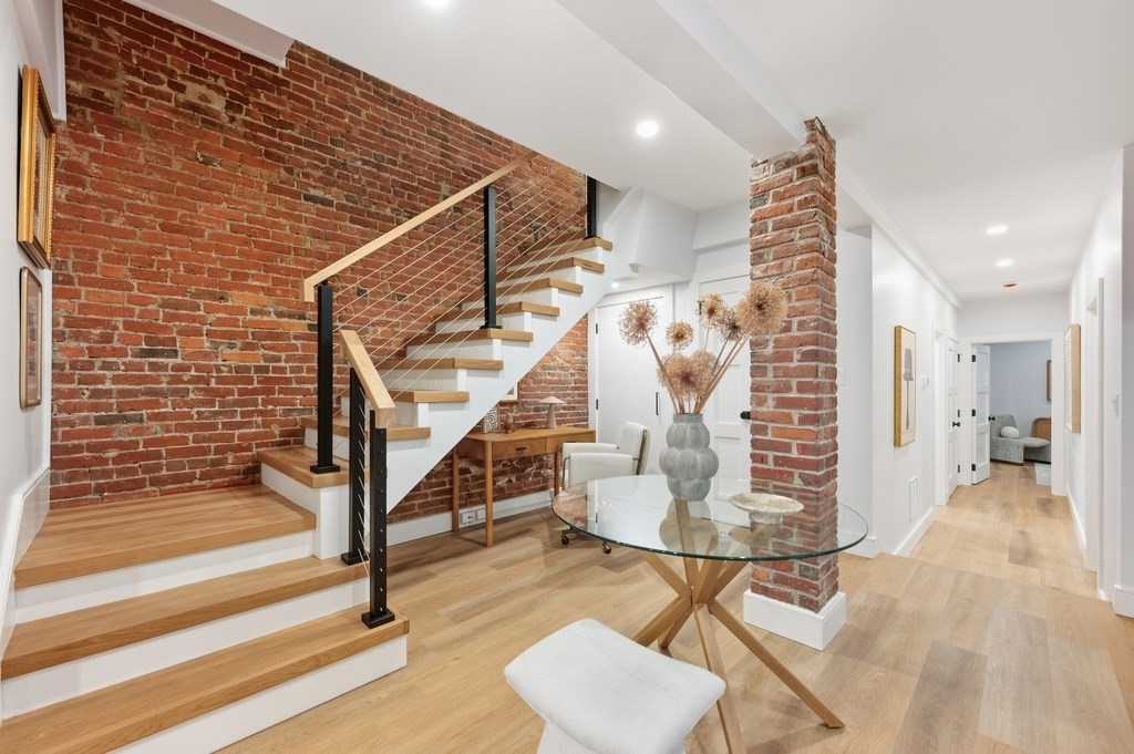 94 St Botolph Street, Unit 1 Boston, MA 02116 - Photo 14 of 37 a view of entryway livingroom and hall with wooden floor