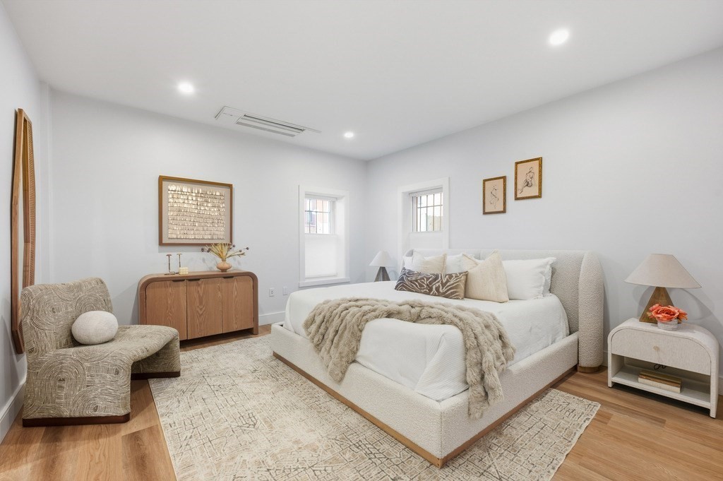 94 St Botolph Street, Unit 1 Boston, MA 02116 - Photo 23 of 37 a bedroom with a bed and a couch