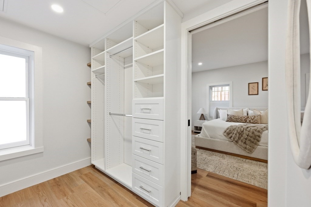 94 St Botolph Street, Unit 1 Boston, MA 02116 - Photo 28 of 37 a bedroom with a bed and a window