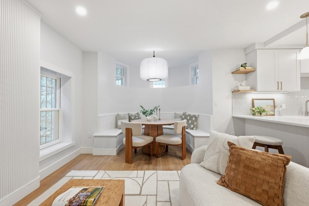 94 St Botolph Street, Unit 1 Boston, MA 02116 - Photo 4 of 37 a dining room with furniture and a window