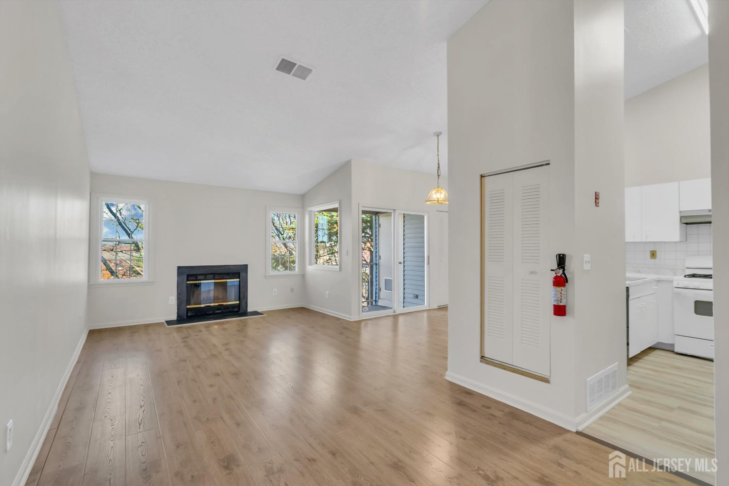 130 Edpas Road New Brunswick, NJ 08901 - Photo 3 of 18 a view of a livingroom with wooden floor