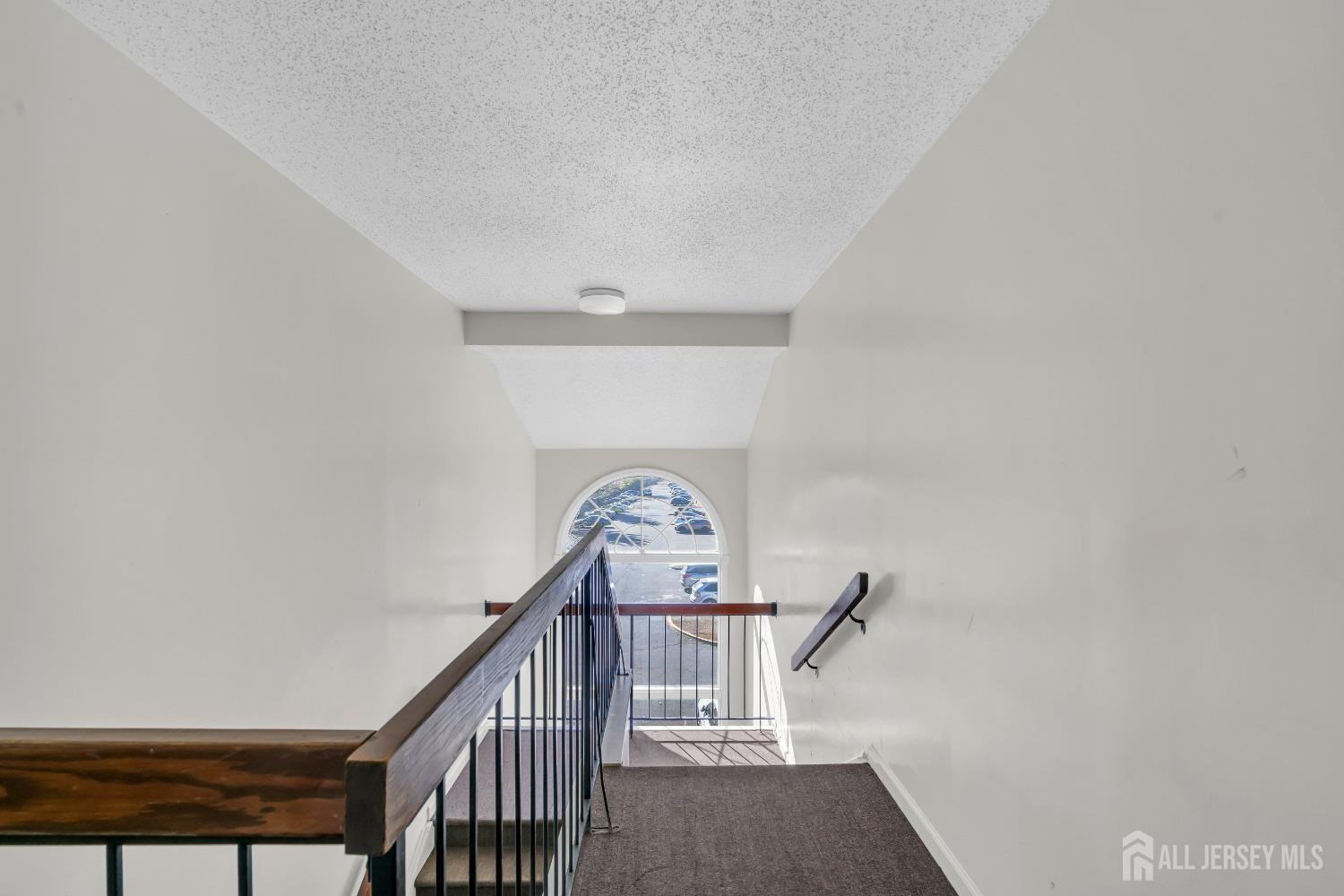 130 Edpas Road New Brunswick, NJ 08901 - Photo 4 of 18 a view of a hallway with staircase