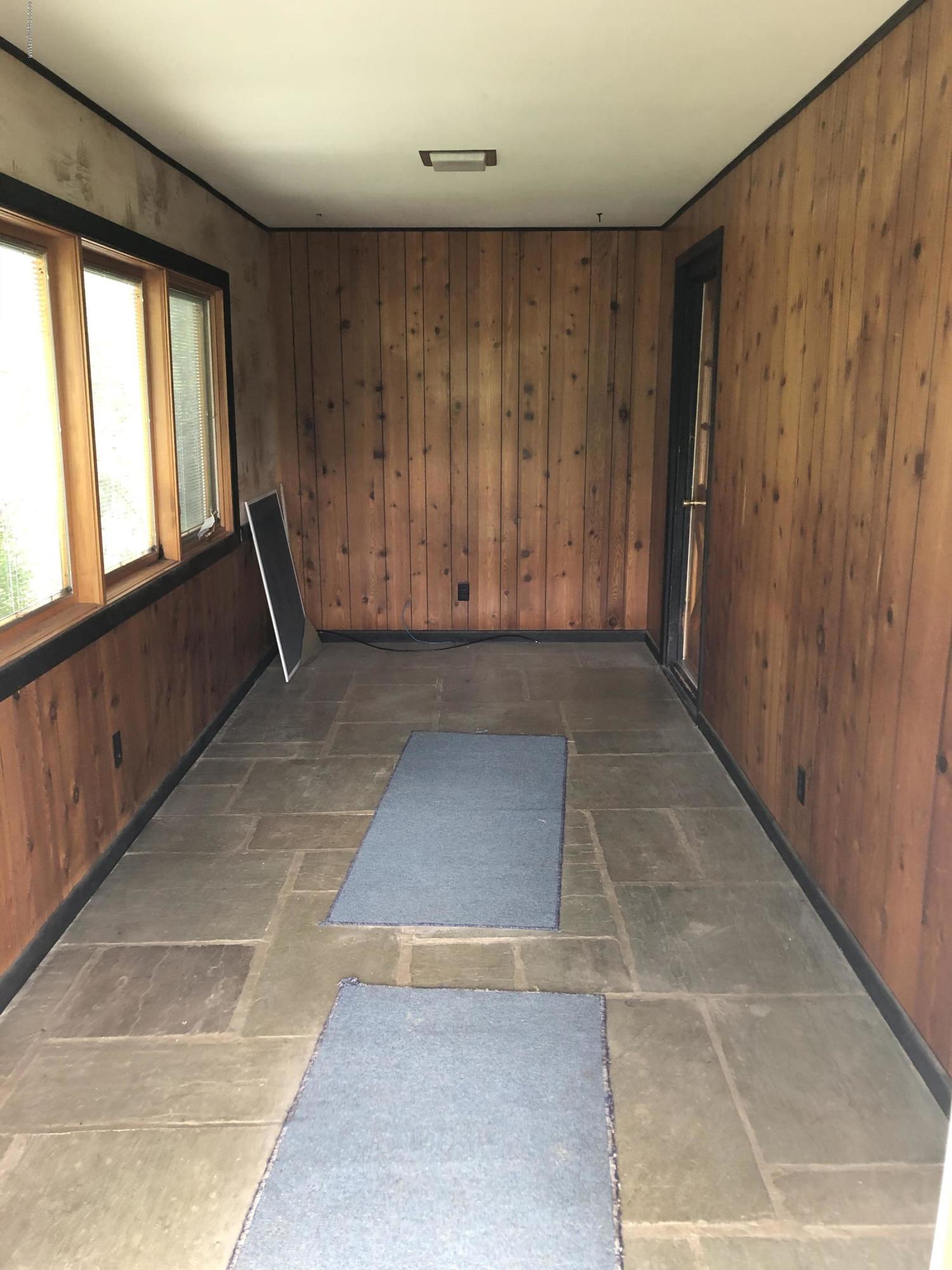 571 Spring Hill Road Moscow, PA 18444 - Photo 9 of 29 a view of entryway with hardwood