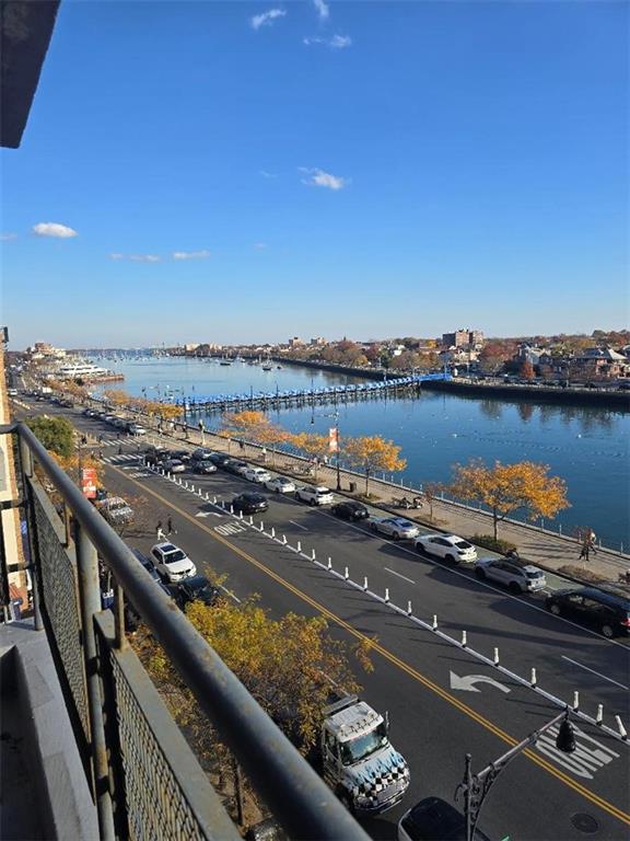 1625 Emmons Avenue, Unit 5D Brooklyn, NY 11235 - Photo 2 of 23 a view of a terrace with wooden floor and city view