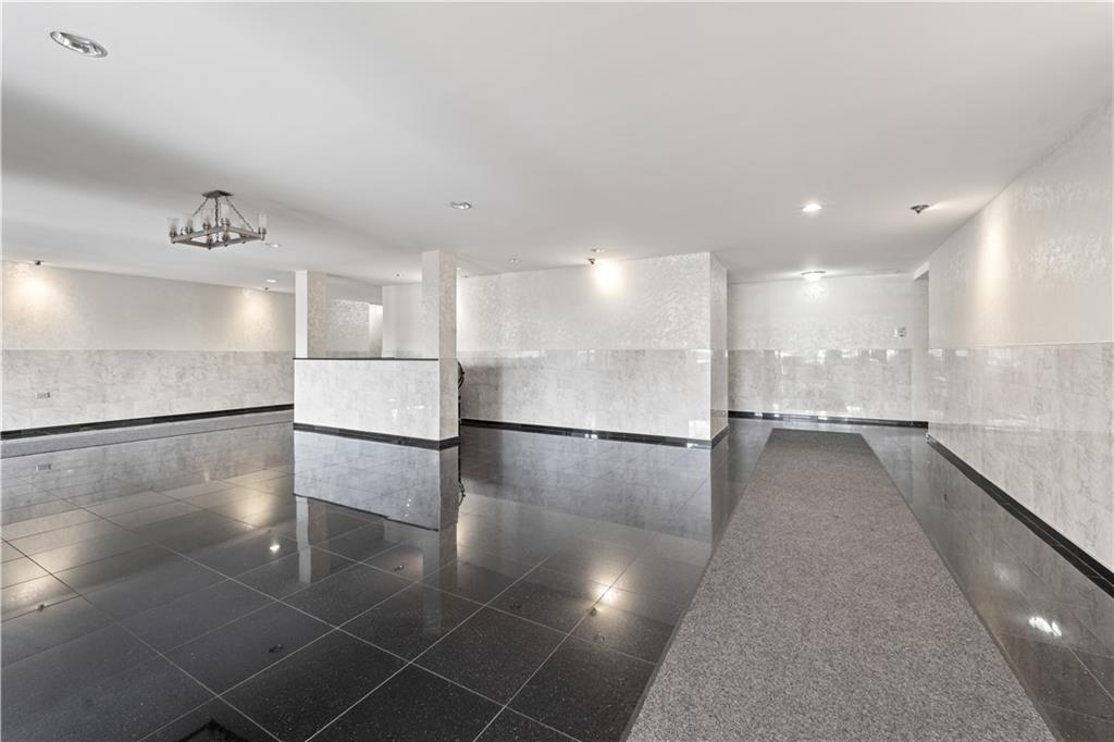 1625 Emmons Avenue, Unit 5D Brooklyn, NY 11235 - Photo 21 of 23 a view of a kitchen with a sink and an oven