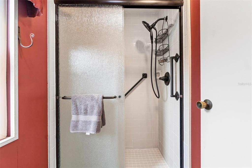 12501 Ulmerton Road, Unit 110 Largo, FL 33774 - Photo 16 of 29 a bathroom with a shower