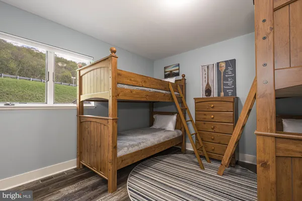 a bedroom with bunk bed