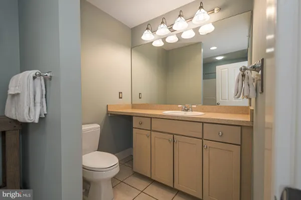 a view of a balcony with wooden floor and city view