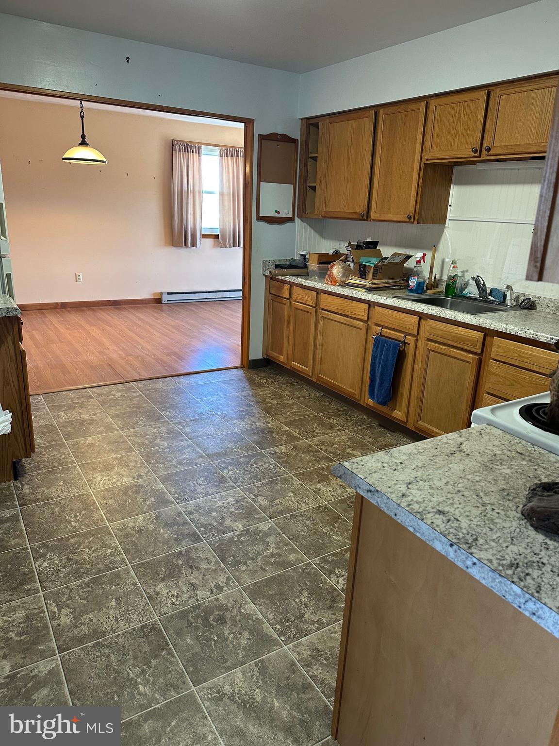 266 Jackson Road Quarryville, PA 17566 - Photo 13 of 32 a kitchen with stainless steel appliances granite countertop a sink stove and cabinets