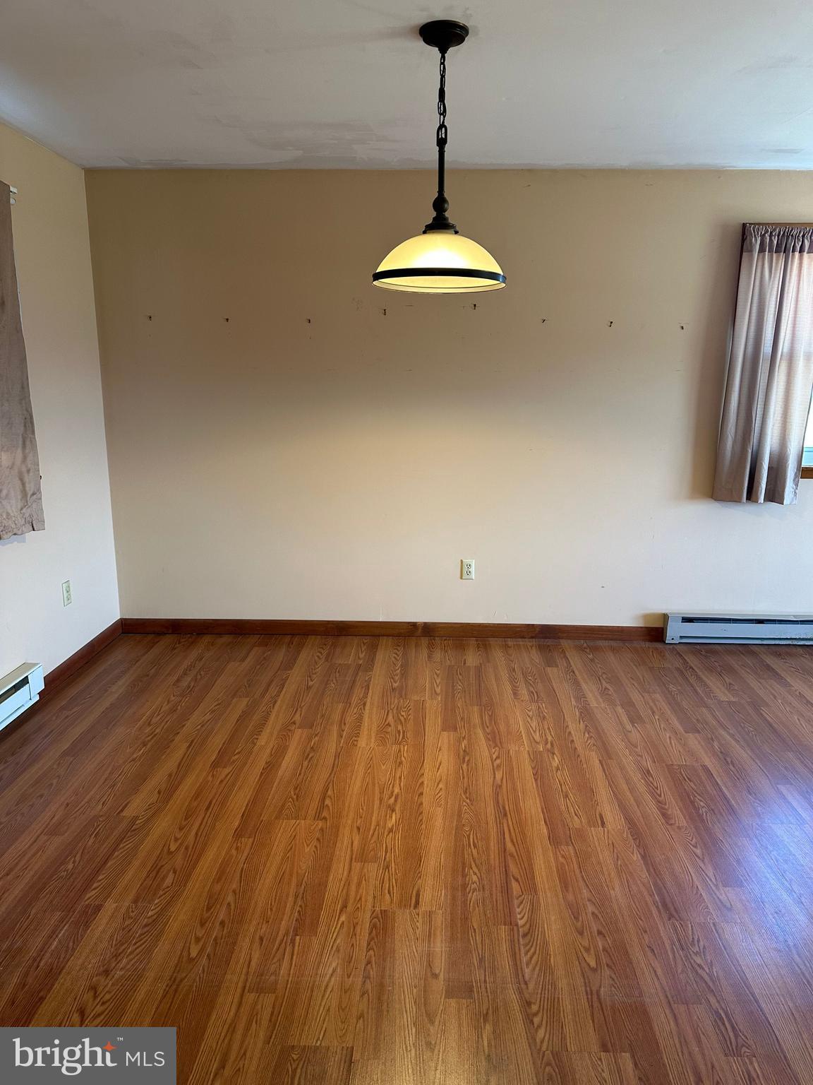 266 Jackson Road Quarryville, PA 17566 - Photo 16 of 32 a view of a room with wooden floor and a window