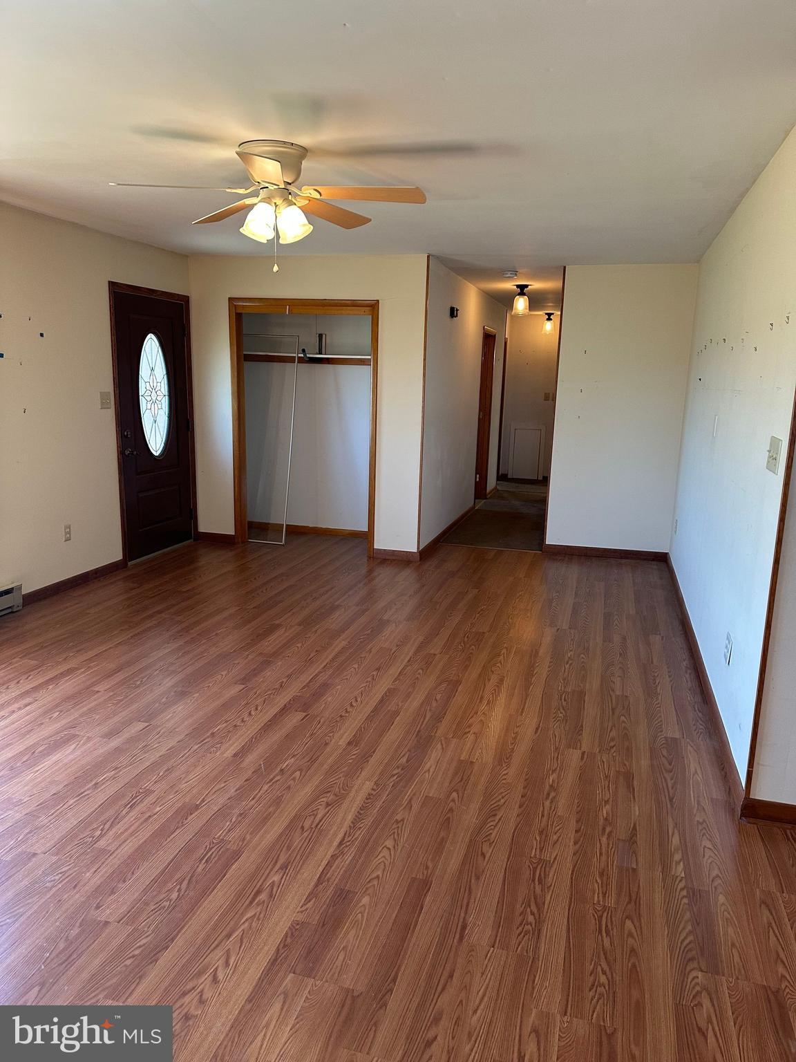 266 Jackson Road Quarryville, PA 17566 - Photo 18 of 32 an empty room with wooden floor and windows