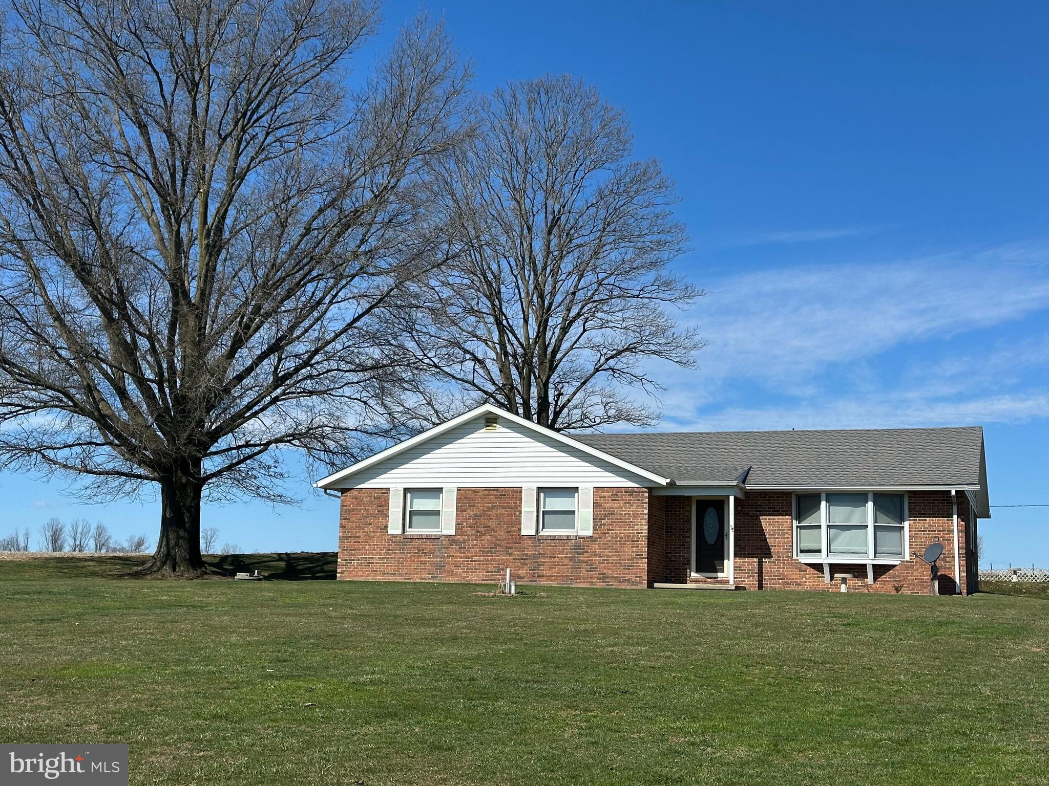 266 Jackson Road Quarryville, PA 17566 - Photo 5 of 32 a front view of a house with a yard