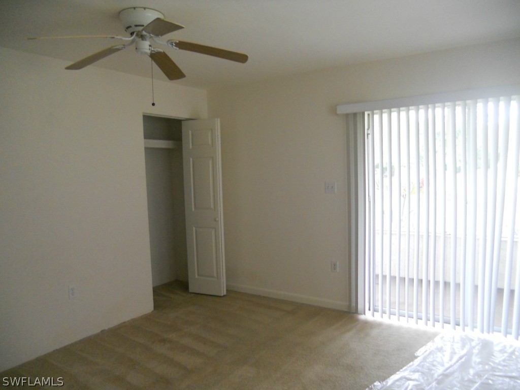 8140 County Road, Unit 102 Fort Myers, FL 33919 - Photo 1 of 16 an empty room with a window