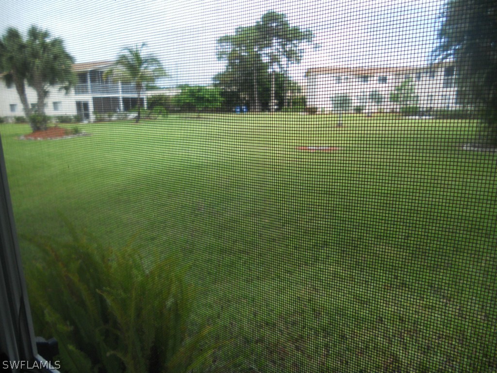 8140 County Road, Unit 102 Fort Myers, FL 33919 - Photo 8 of 16 a view of a green field