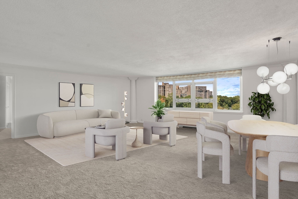 280 Boylston Street, Unit 905 Newton, MA 02467 - Photo 1 of 22 a living room with furniture and a large window