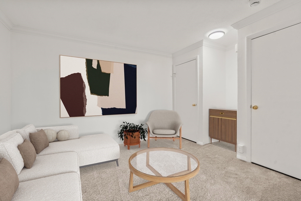 280 Boylston Street, Unit 905 Newton, MA 02467 - Photo 11 of 22 a living room with furniture