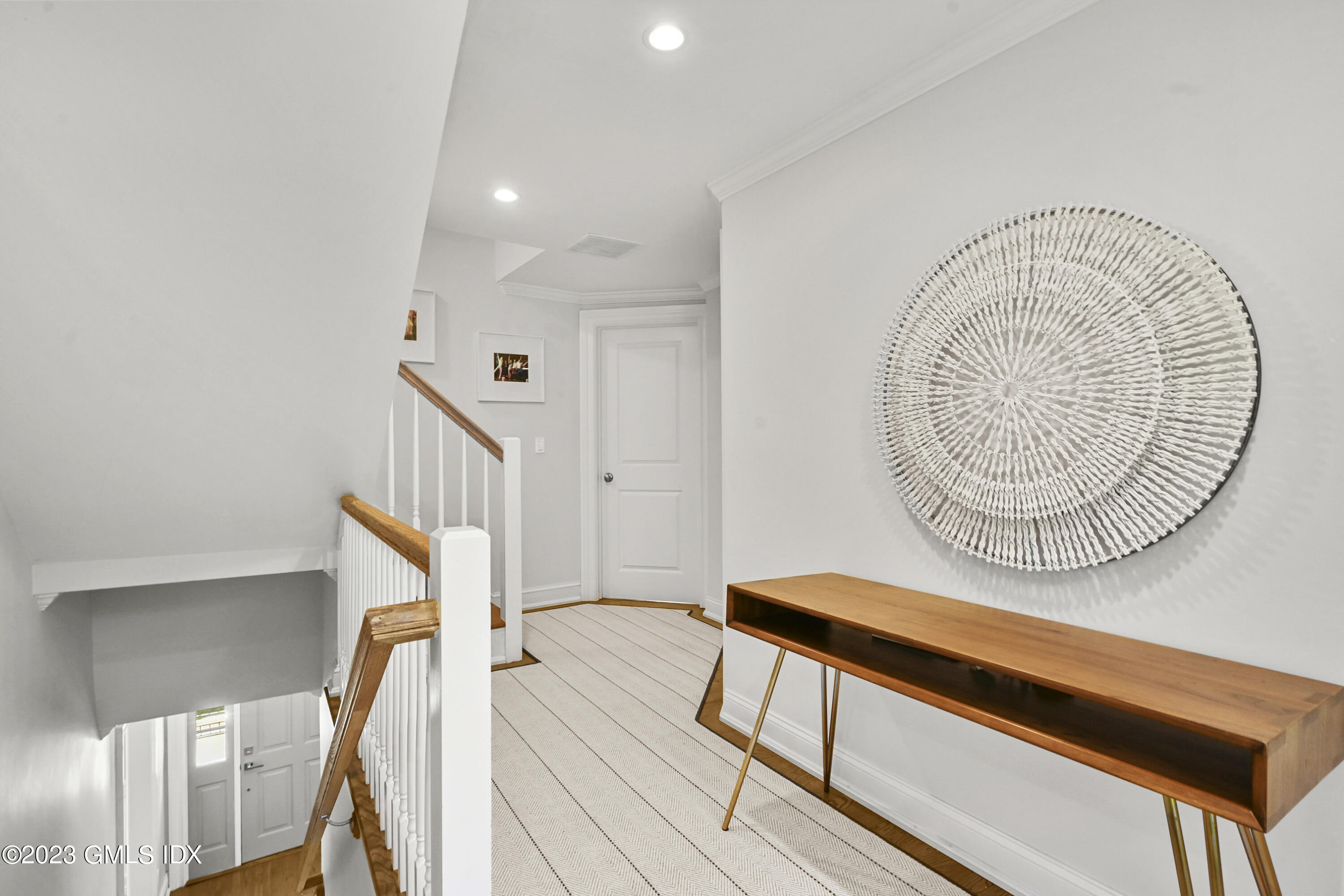 36 Evergreen Road Greenwich, CT 06830 - Photo 18 of 42 a view of a hallway with staircase