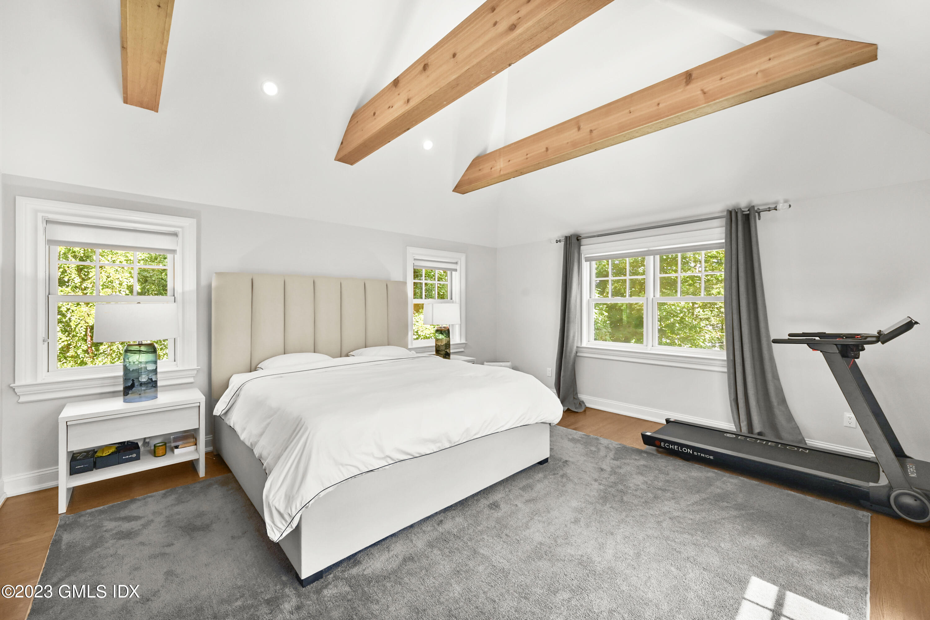 36 Evergreen Road Greenwich, CT 06830 - Photo 20 of 42 a bedroom with a bed and a window