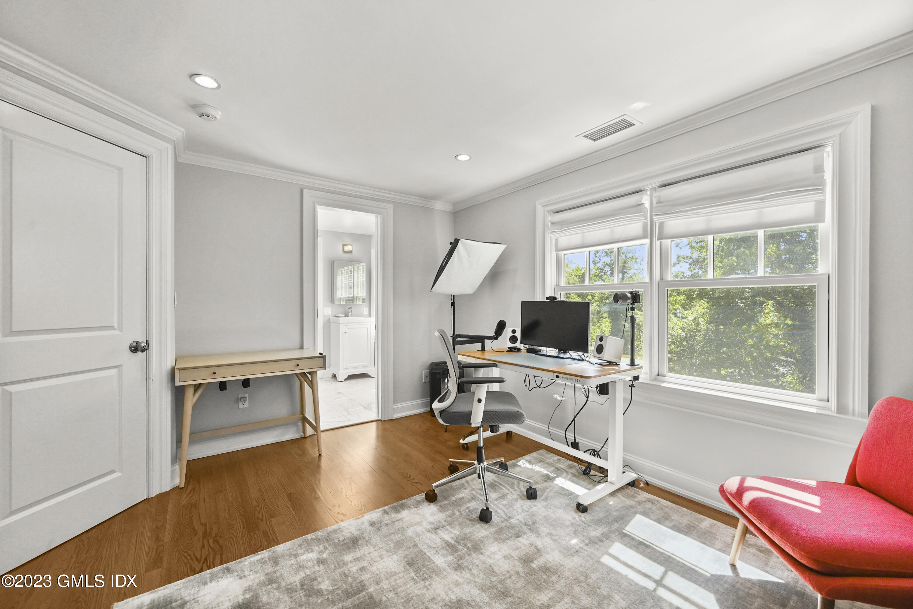36 Evergreen Road Greenwich, CT 06830 - Photo 26 of 42 a work room with furniture a wooden floor and a window