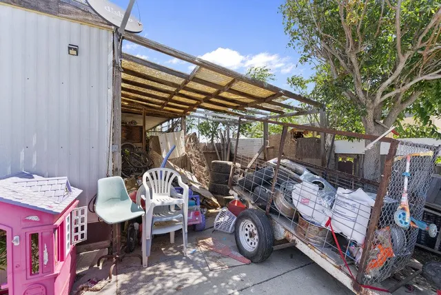 a view of a chairs and tables in patio