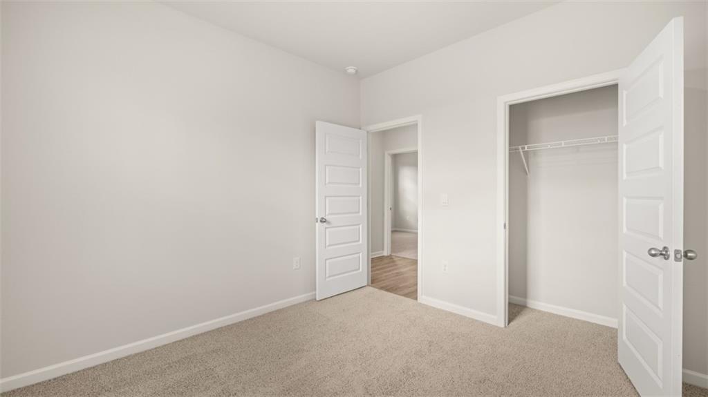 2242 Edgecombe Lane Dacula, GA 30019 - Photo 31 of 33 a view of an empty room