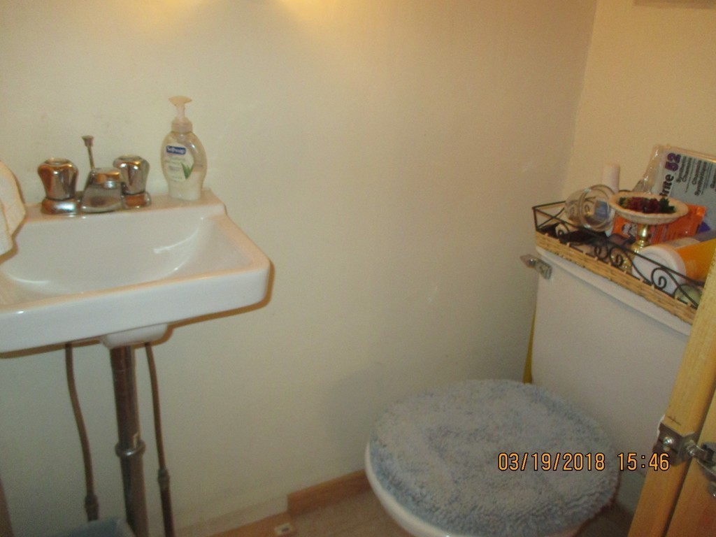 17-19 Pondover Road Billerica, MA 01821 - Photo 8 of 28 a bathroom with a sink and a toilet