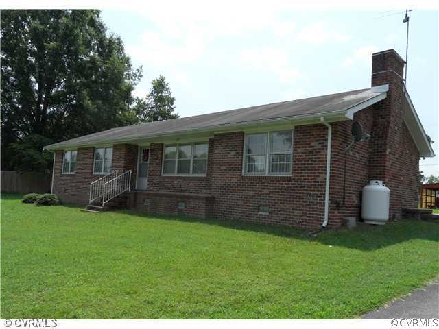 25419 Front Road Petersburg, VA 23803 - Photo 2 of 4 a view of a house with a yard