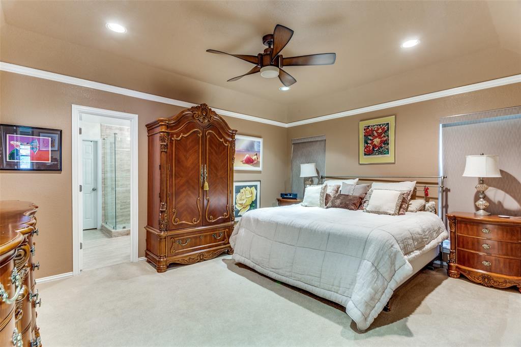 2229 Weatherbee Street Fort Worth, TX 76110 - Photo 16 of 25 Bedroom featuring ensuite bath, baseboards, ornamental molding, light carpet, and recessed lighting