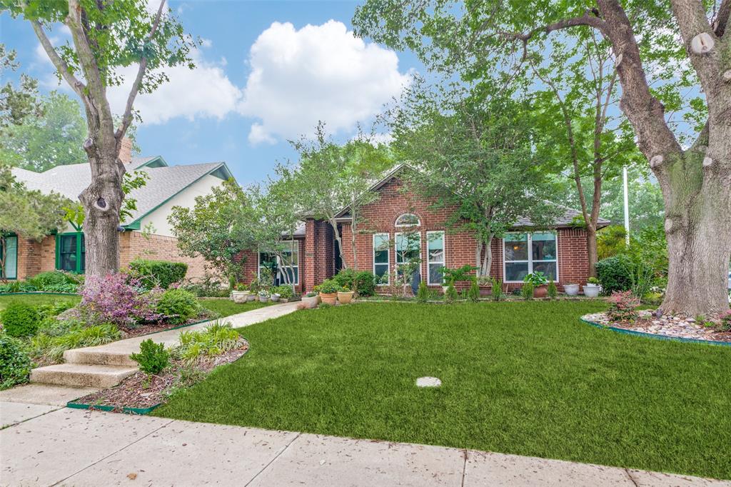 2229 Weatherbee Street Fort Worth, TX 76110 - Photo 2 of 25 View of front of property with a front lawn and brick siding