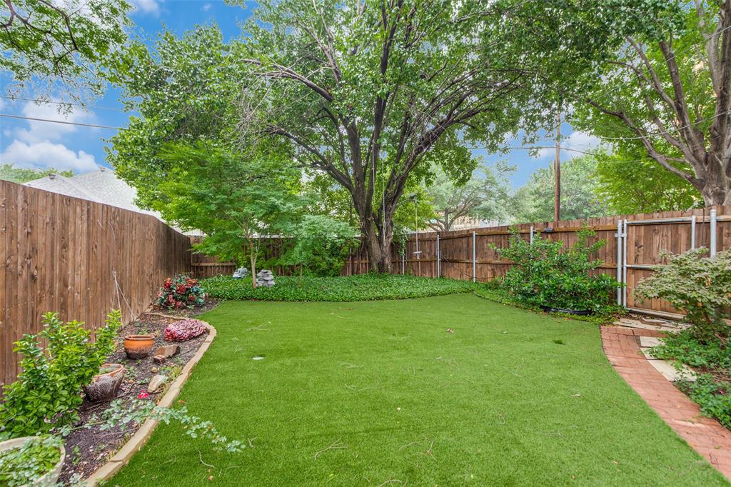 2229 Weatherbee Street Fort Worth, TX 76110 - Photo 24 of 25 View of yard with a fenced backyard