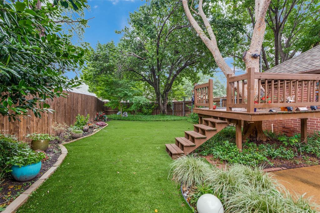 2229 Weatherbee Street Fort Worth, TX 76110 - Photo 25 of 25 View of yard with a fenced backyard and a wooden deck