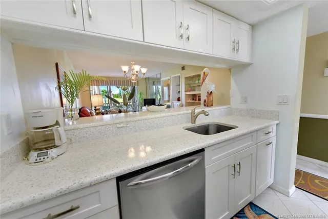 a bed room with a bed and a night stand