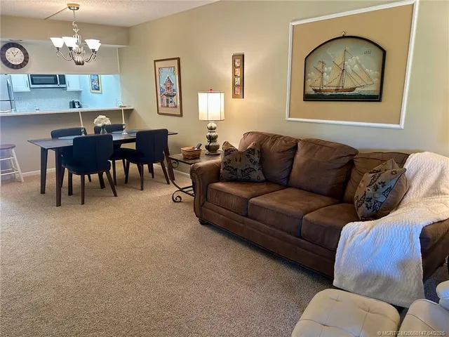 a view of a workspace with furniture